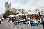 Cambridge, the market in with Great St Mary's Church in the background.